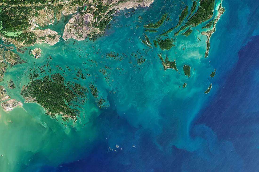 Bai Tu Long Bay Vietnam limestone karst eco-cruise — book Vietnam eco-stays via IMPT